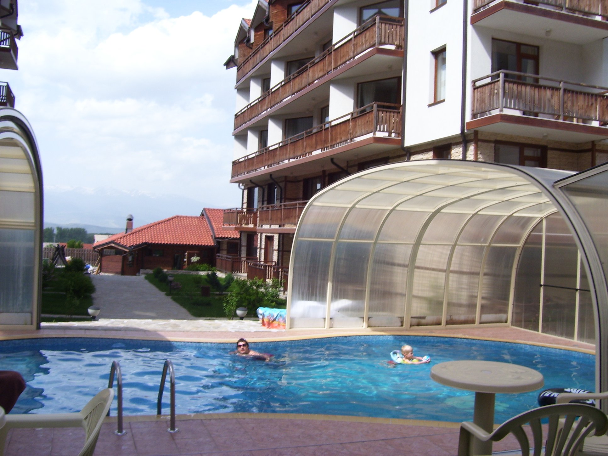 Hotel Bansko Bulgaria nomad remote a9f67a77-3580-463e-8c07-e4badc791fca_Nomads Stays Four Leaf Clover Pool view.jpg